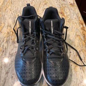 Under Armour football cleats.